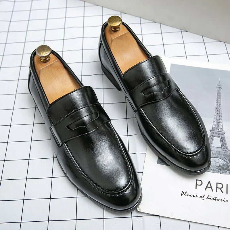 Men's penny loafers with slip-on design, almond toe and low heel
