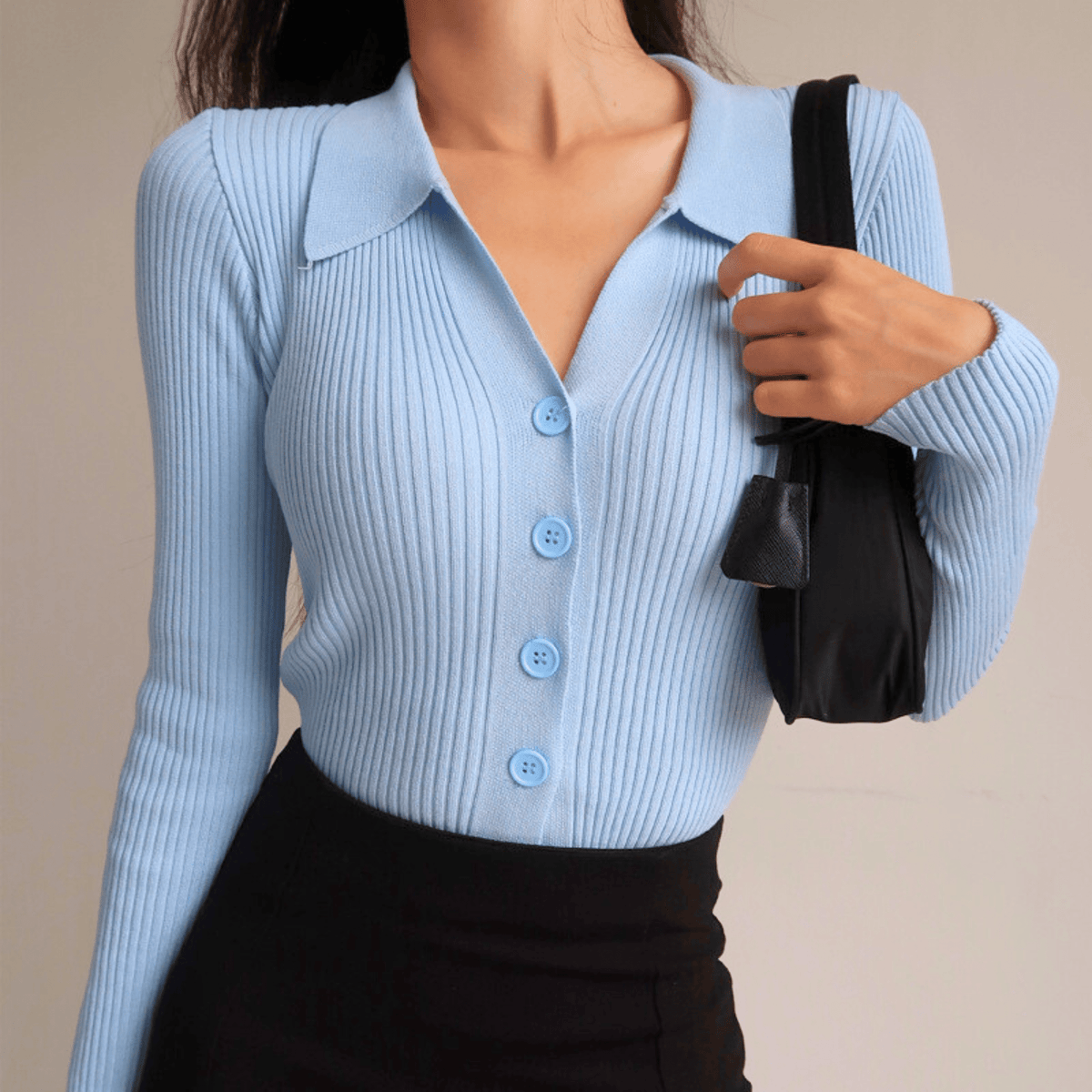 Women's ribbed button-front cardigan sweater with pointed collar