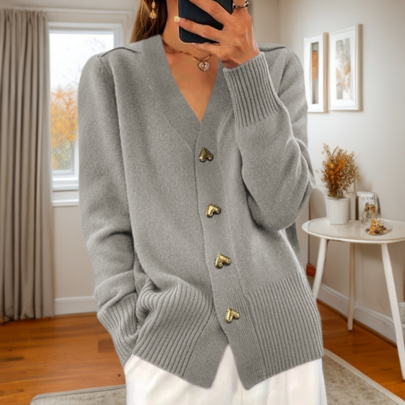 Women's V-neck cardigan with gold heart buttons, front pockets and ribbed trims