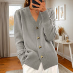 Women's V-neck cardigan with gold heart buttons, front pockets and ribbed trims
