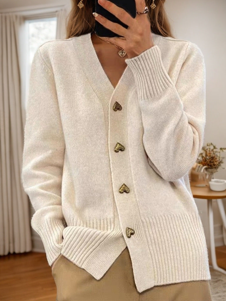 Women's V-neck cardigan with gold heart buttons, front pockets and ribbed trims
