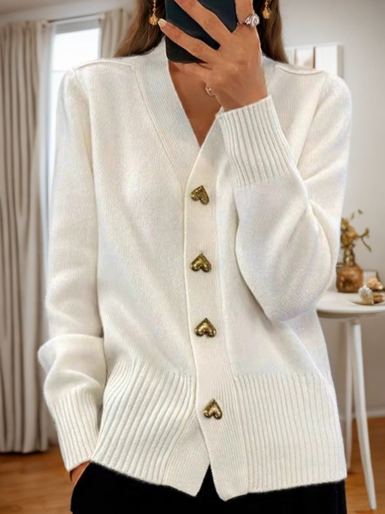 Women's V-neck cardigan with gold heart buttons, front pockets and ribbed trims
