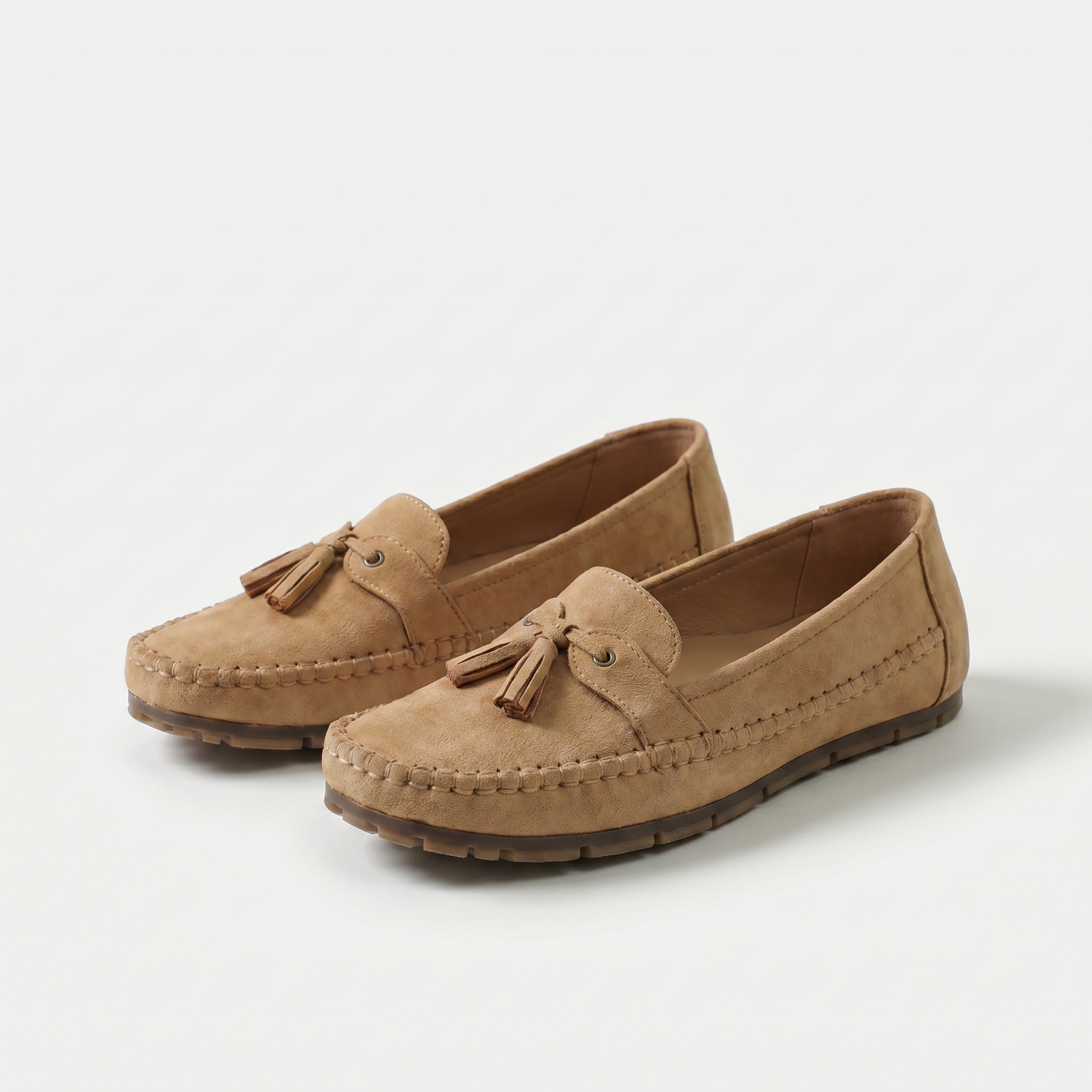 Women's moc toe loafers with decorative tassels