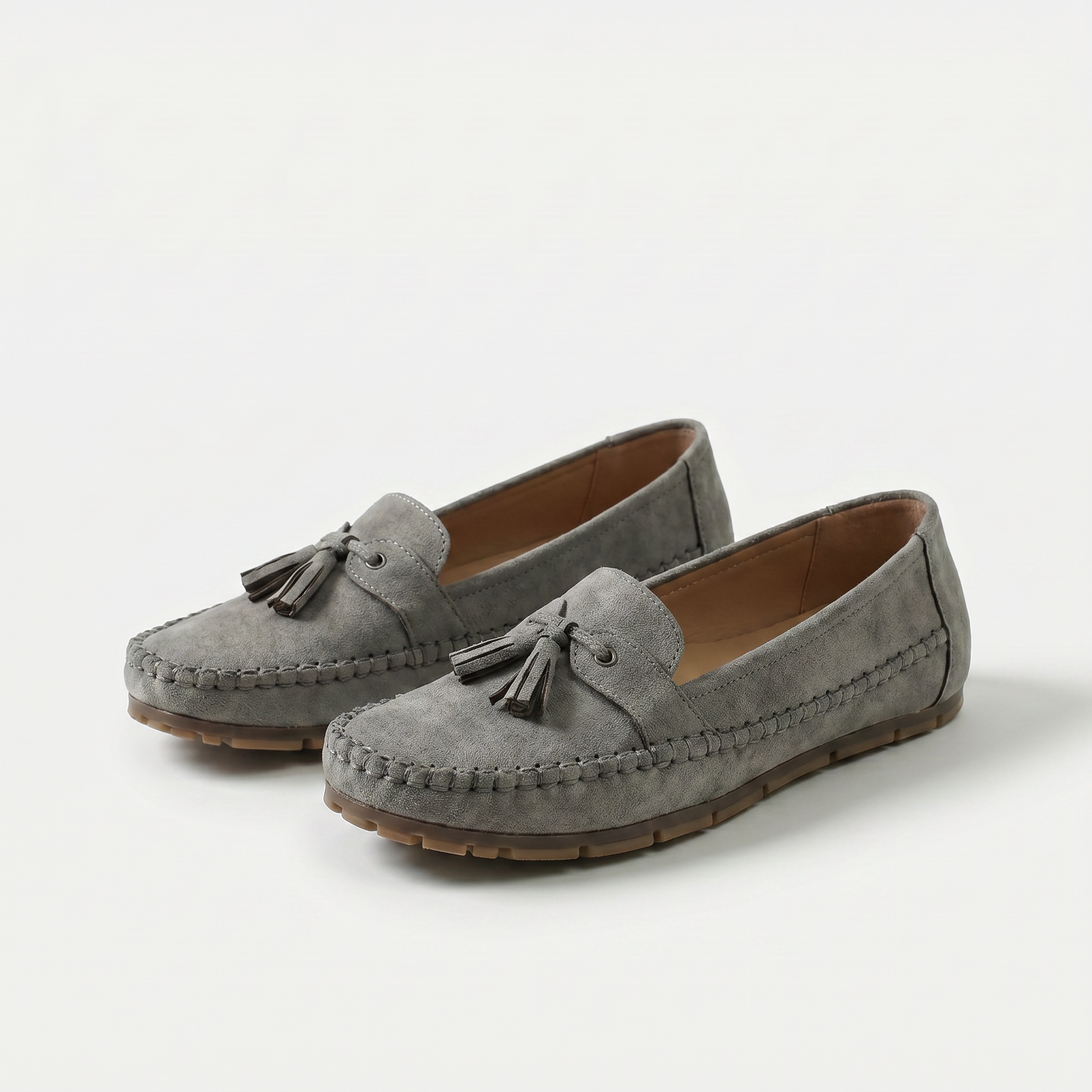 Women's moc toe loafers with decorative tassels