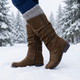 Women's knee-high boots with side zipper and buckle straps
