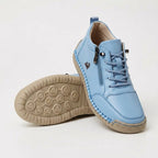 Women's plain lace-up trainers with side zip, round toe and flat textured sole