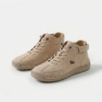 Ankle-height lace-up sneakers with stitched panels, ankle straps and contrast soles