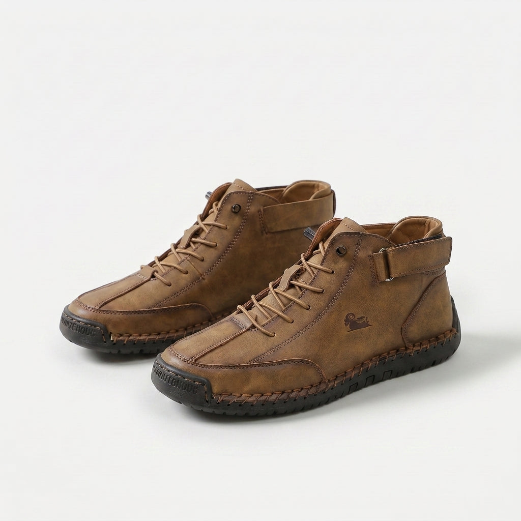 Ankle-height lace-up sneakers with stitched panels, ankle straps and contrast soles