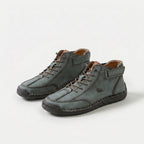 Ankle-height lace-up sneakers with stitched panels, ankle straps and contrast soles
