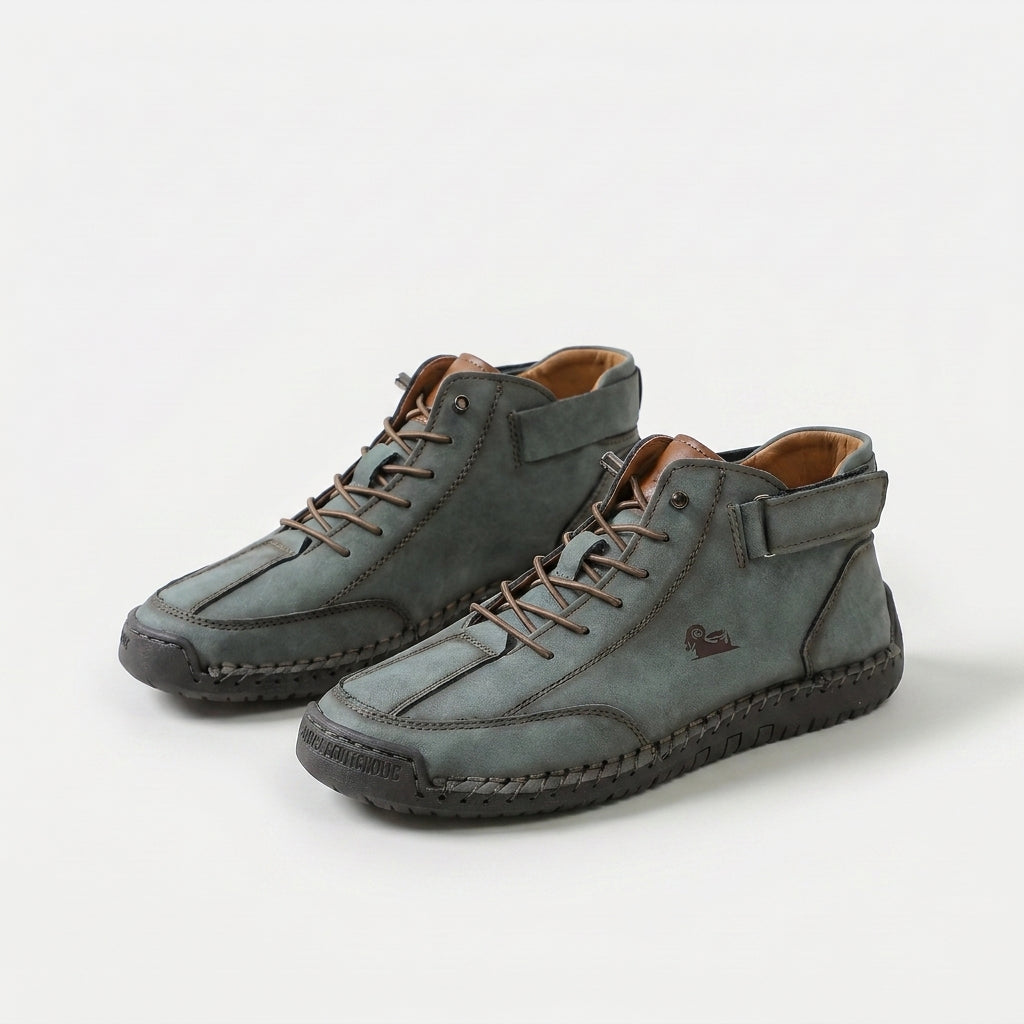 Ankle-height lace-up sneakers with stitched panels, ankle straps and contrast soles