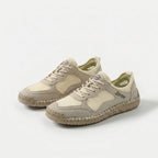 Panel trainers with lace-up fastening, mesh-look inserts and textured sole