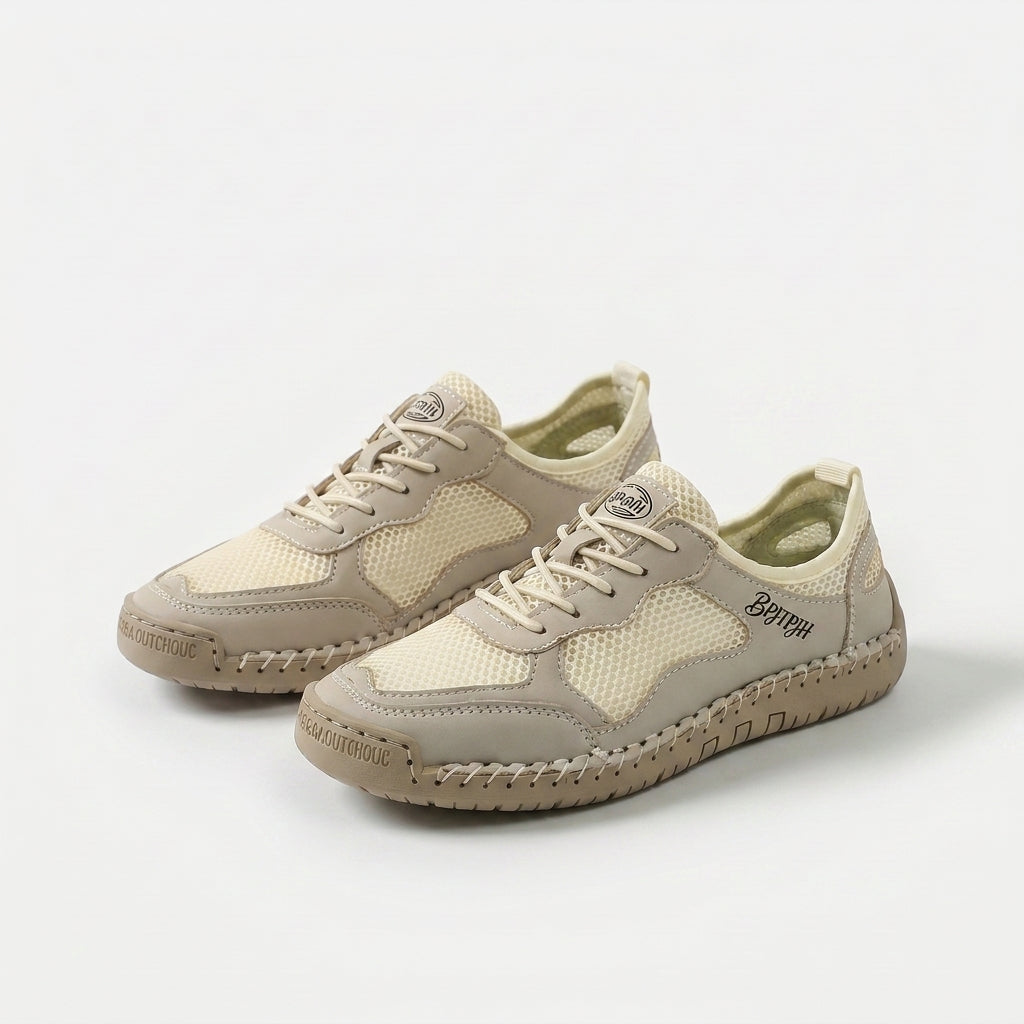 Panel trainers with lace-up fastening, mesh-look inserts and textured sole