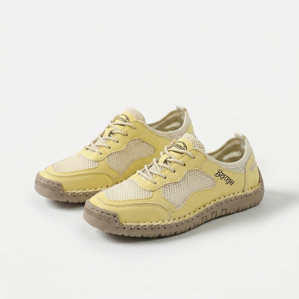 Panel trainers with lace-up fastening, mesh-look inserts and textured sole