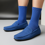Men's slip-on loafers with moccasin stitching and flat soles