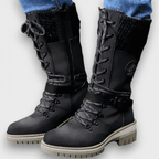 Women's mid-calf lace-up boots with buckle straps, side zips and chunky ridged soles