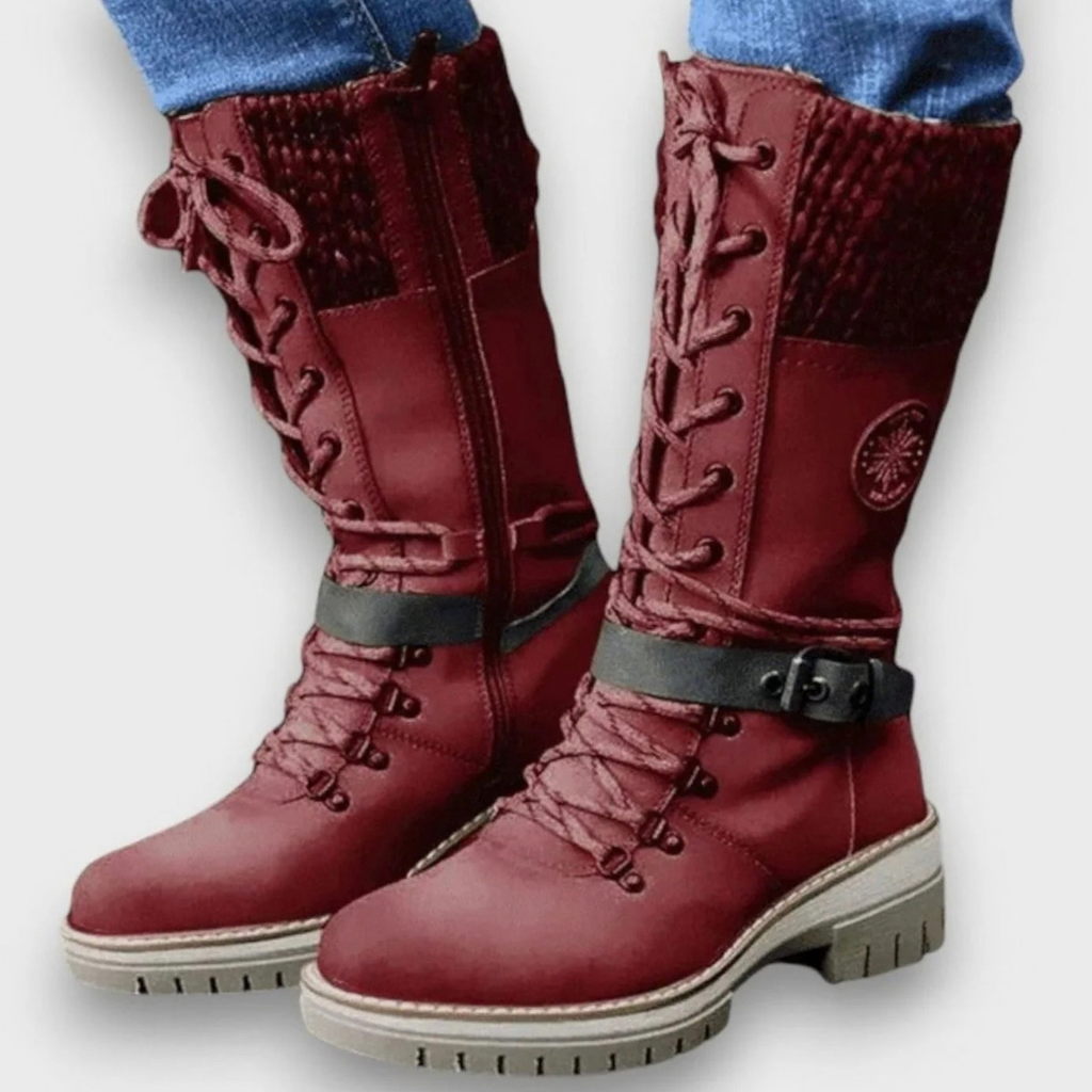 Women's mid-calf lace-up boots with buckle straps, side zips and chunky ridged soles