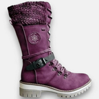 Women's mid-calf lace-up boots with buckle straps, side zips and chunky ridged soles