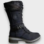 Women's mid-calf lace-up boots with buckle straps, side zips and chunky ridged soles
