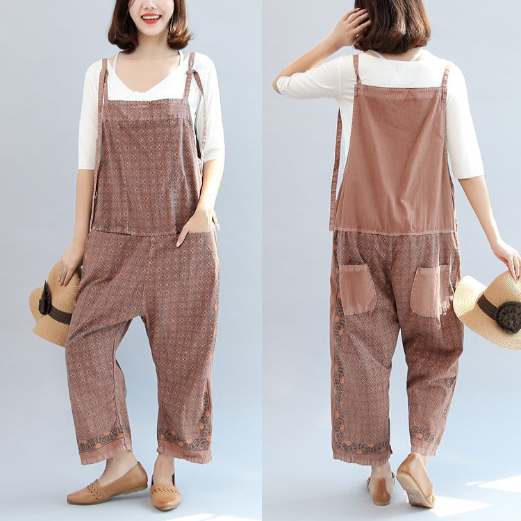 Women's geometric patterned bib jumpsuit with adjustable straps, pockets and cropped wide legs
