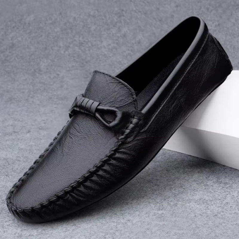 Moccasin loafer with stitched toe and knotted trim