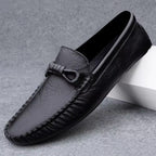 Moccasin loafer with stitched toe and knotted trim