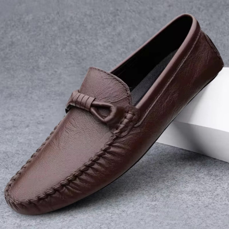 Moccasin loafer with stitched toe and knotted trim
