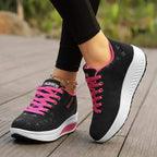 Women's low-top lace-up sneaker with printed symbols, round toe and white sole