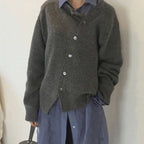 Women's asymmetric knitted cardigan with button front and long sleeves