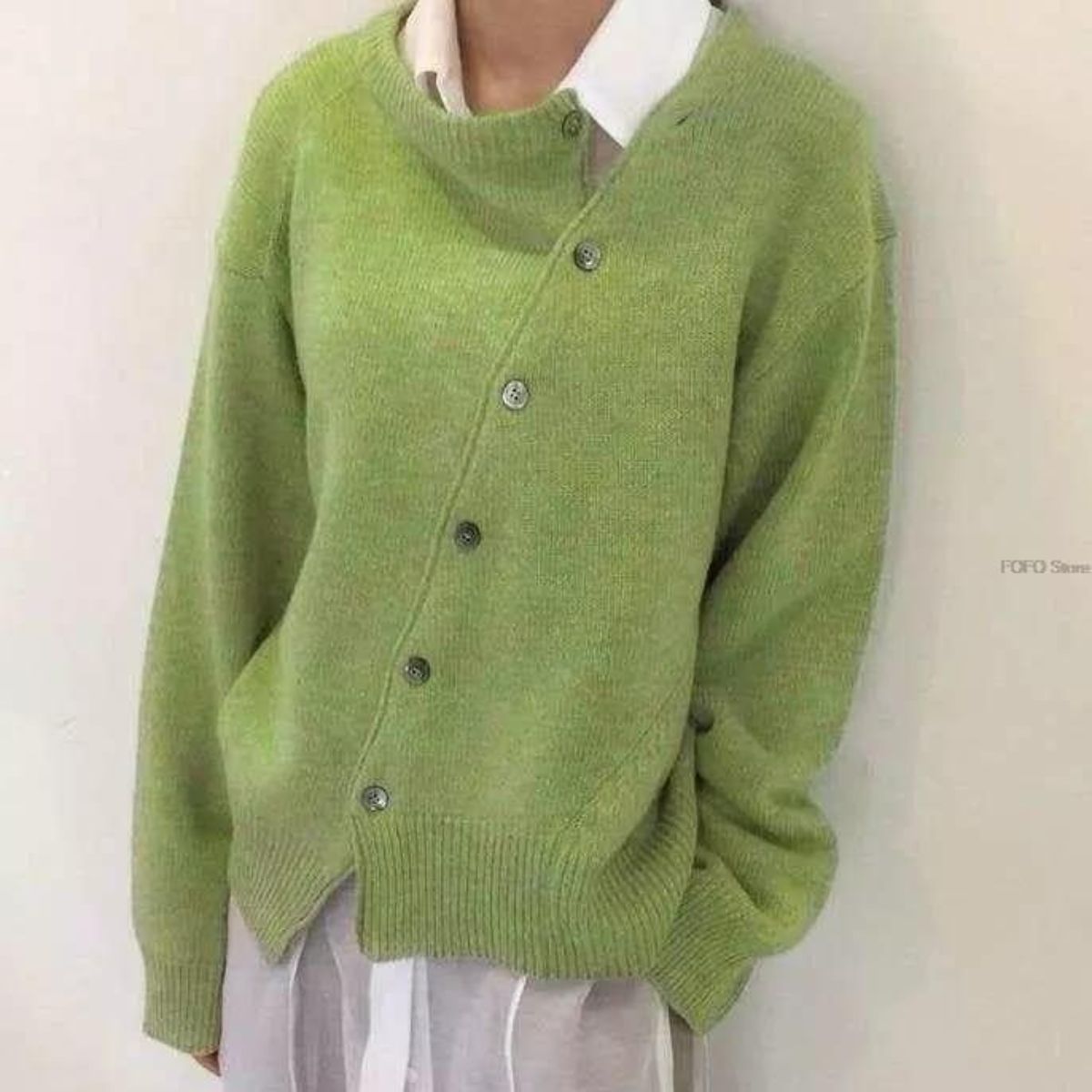Women's asymmetric knitted cardigan with button front and long sleeves