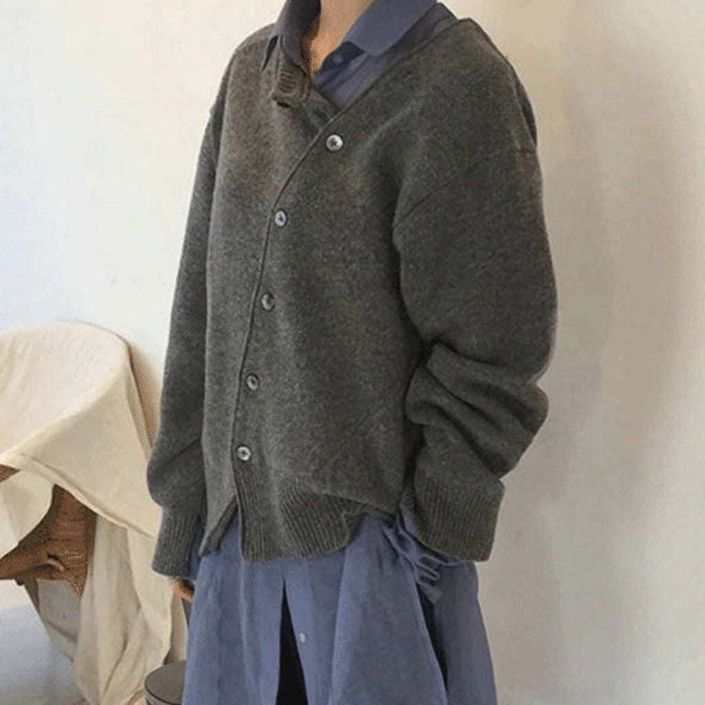 Women's asymmetric knitted cardigan with button front and long sleeves