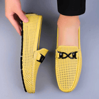 Perforated loafers with buckle detail and flat driving sole