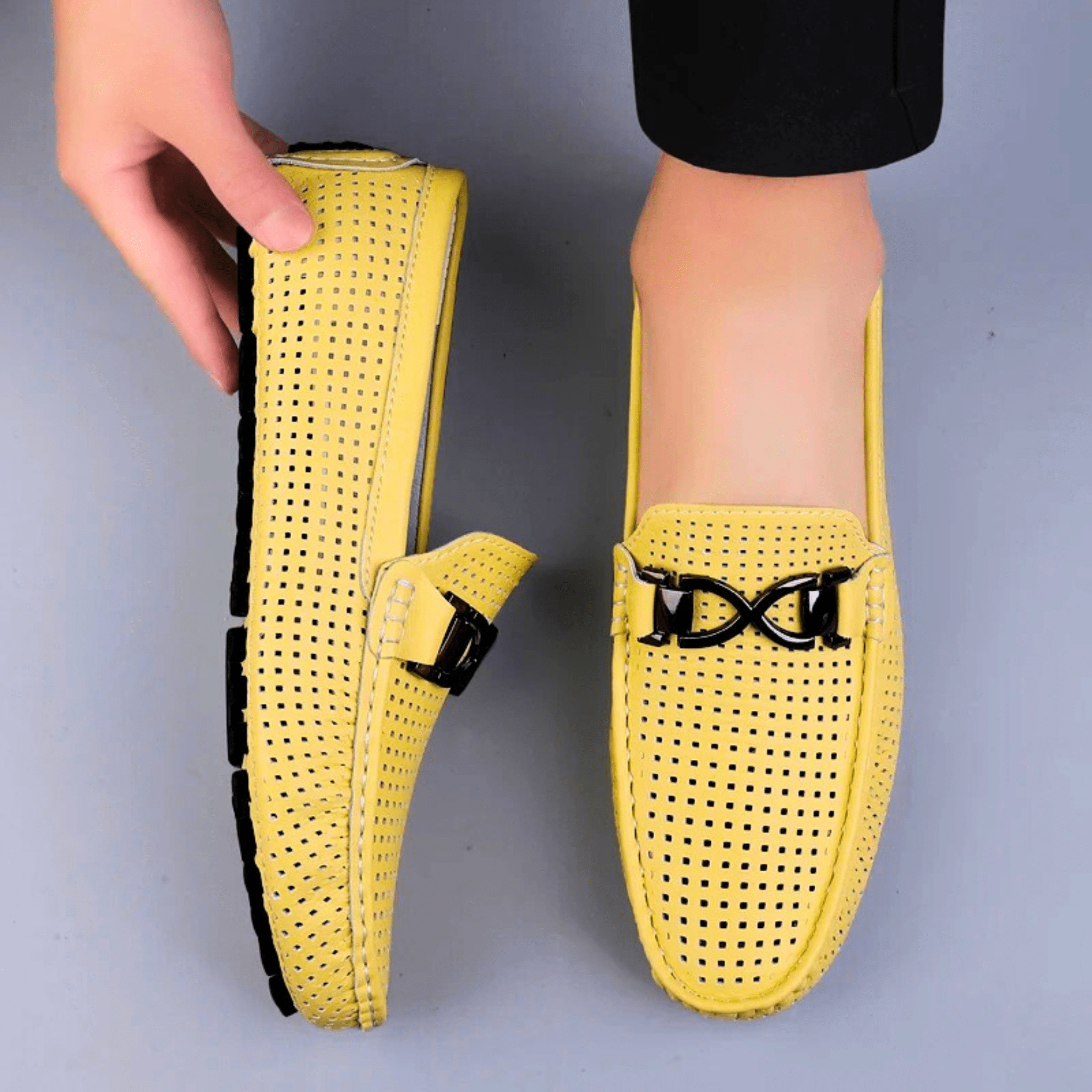 Perforated loafers with buckle detail and flat driving sole