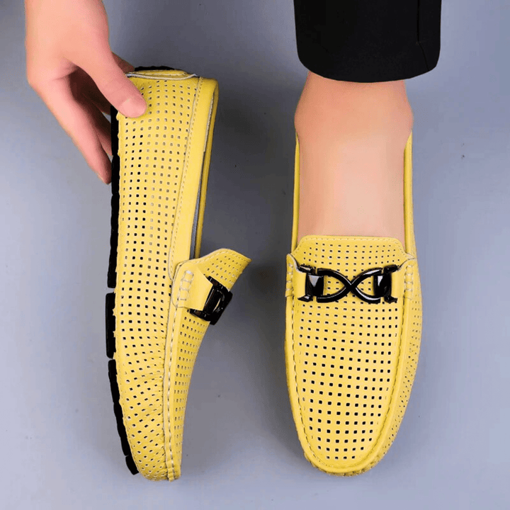 Perforated loafers with buckle detail and flat driving sole