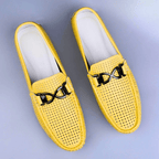 Perforated loafers with buckle detail and flat driving sole