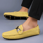 Perforated loafers with buckle detail and flat driving sole