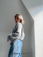 Women's relaxed crew neck sweater with long sleeves and ribbed trims
