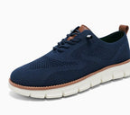 Women's low-profile lace-up trainers with textured upper and segmented sole