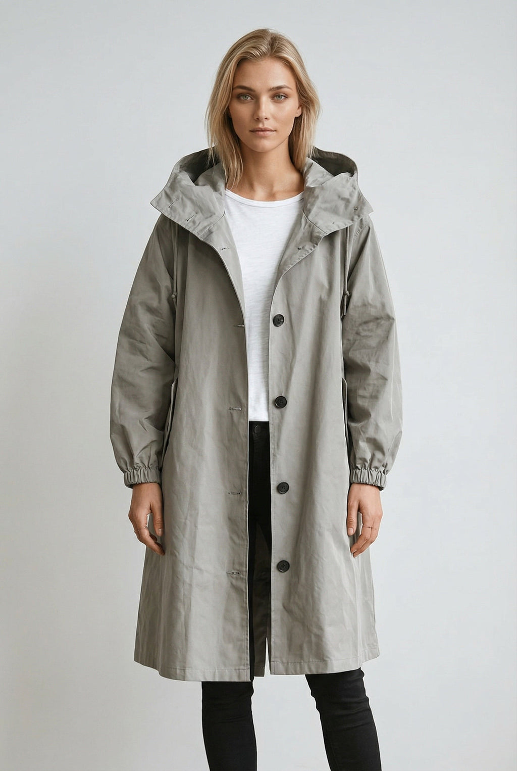 Women's long hooded trench coat with button front and gathered cuffs