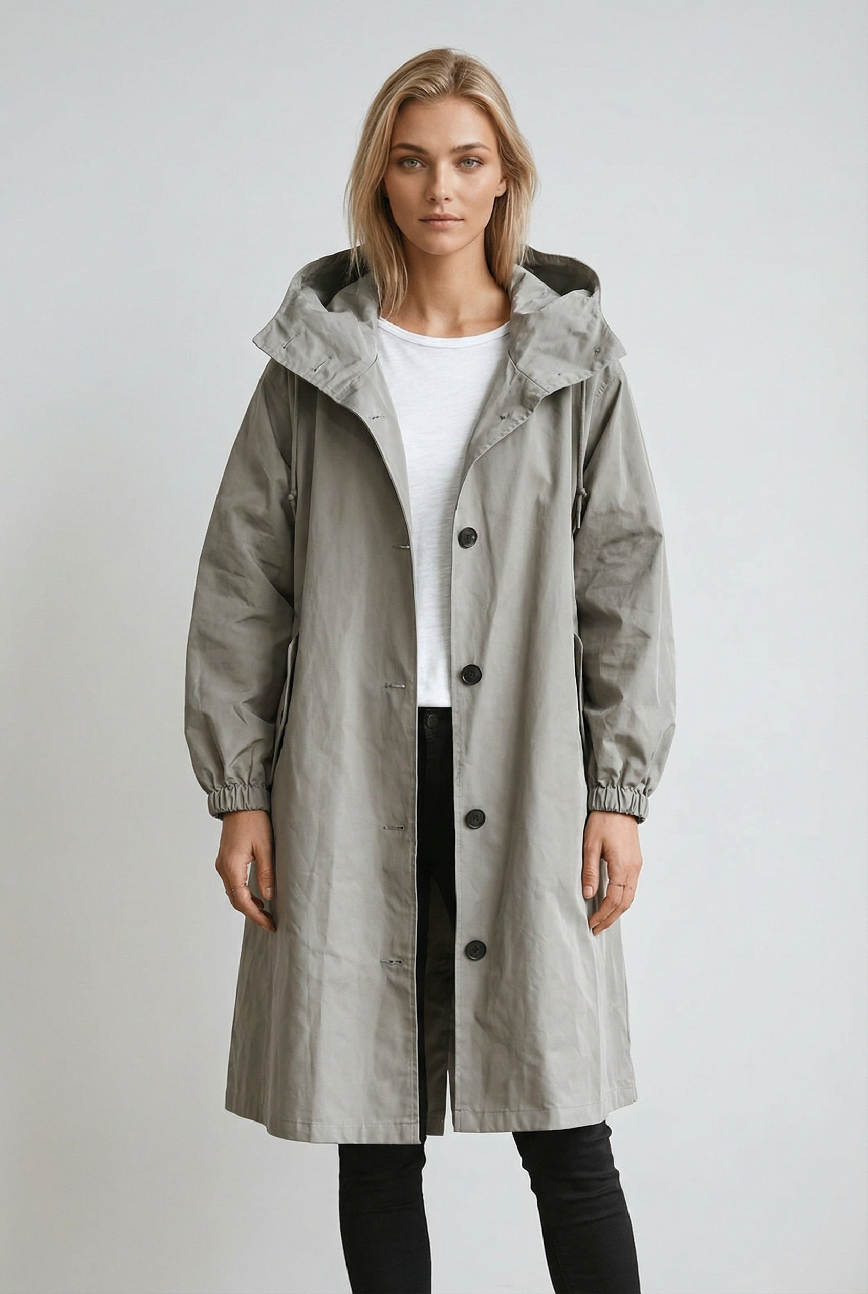 Women's long hooded trench coat with button front and gathered cuffs