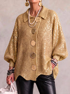 Women's oversized textured cardigan with collared neckline and large metallic buttons