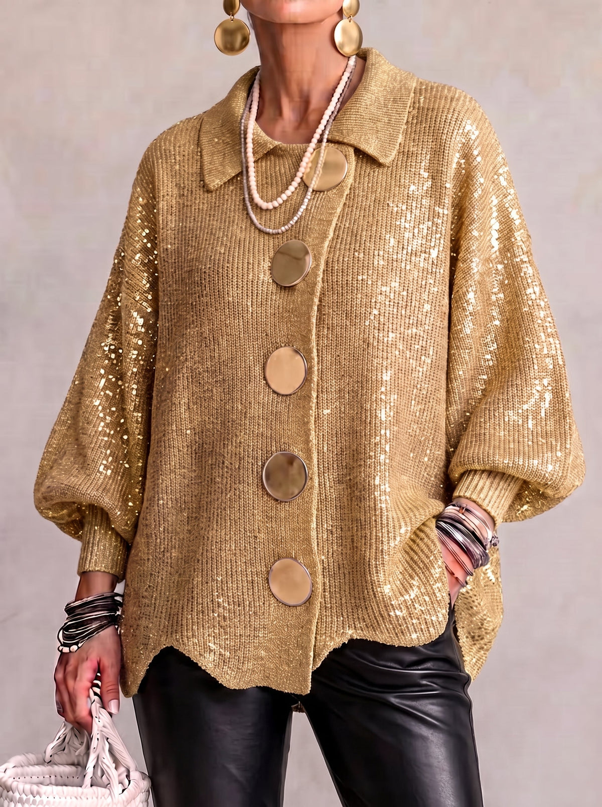 Women's oversized textured cardigan with collared neckline and large metallic buttons