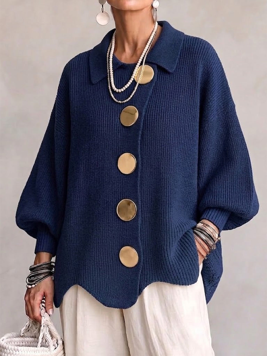 Women's oversized textured cardigan with collared neckline and large metallic buttons