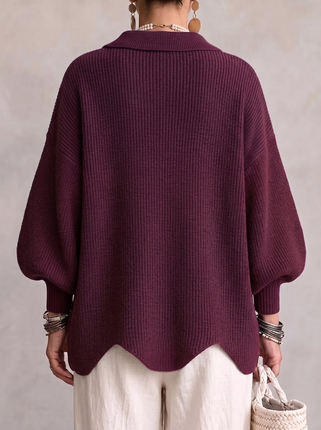 Women's oversized textured cardigan with collared neckline and large metallic buttons