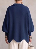 Women's oversized textured cardigan with collared neckline and large metallic buttons