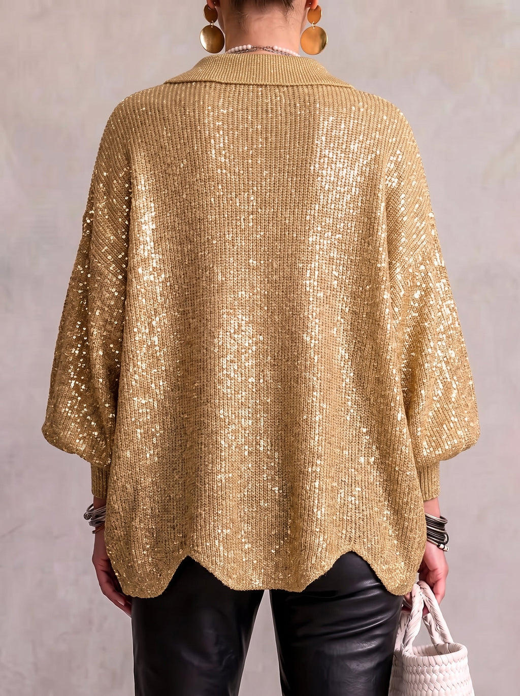 Women's oversized textured cardigan with collared neckline and large metallic buttons