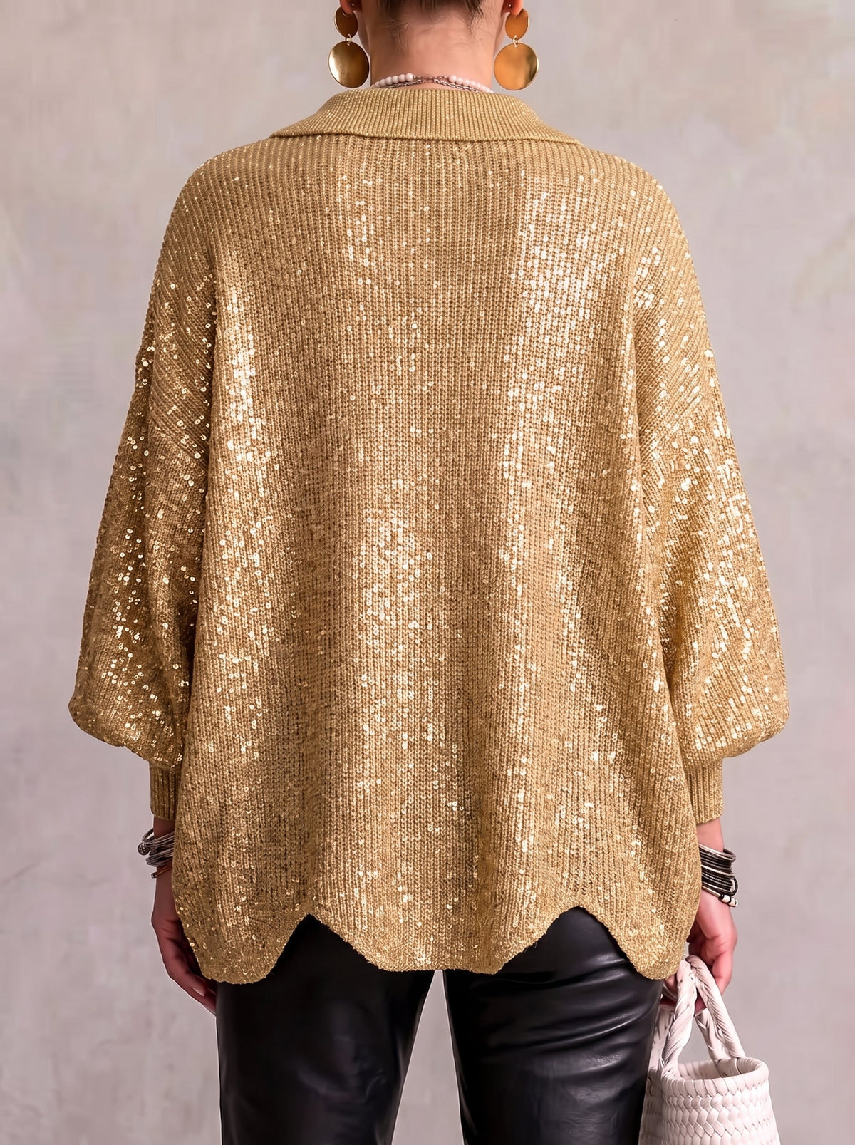 Women's oversized textured cardigan with collared neckline and large metallic buttons