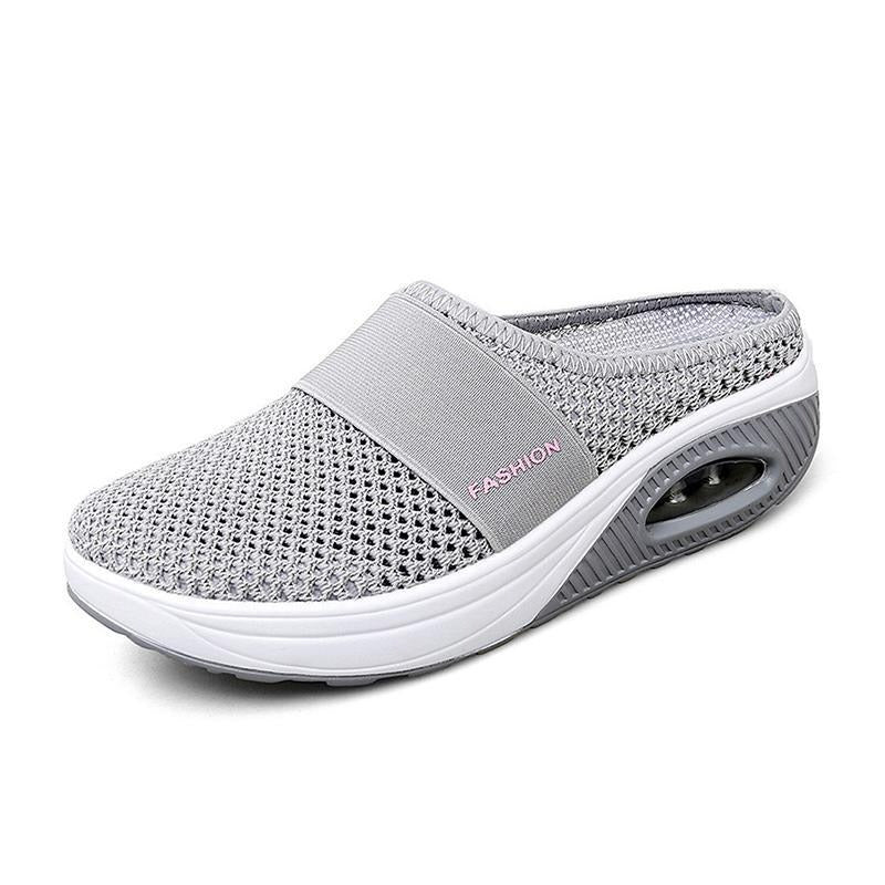 Women's mesh slip-on shoe with visible air-cushion sole