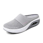 Women's mesh slip-on shoe with visible air-cushion sole