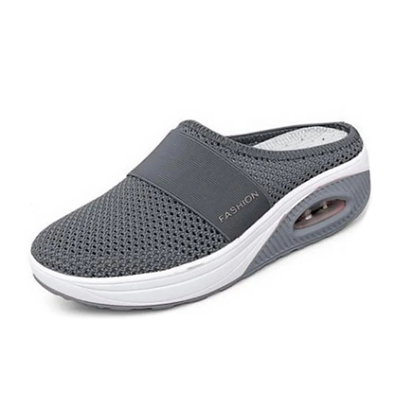 Women's mesh slip-on shoe with visible air-cushion sole