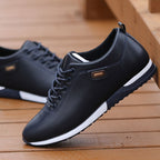 Men's low-top leather trainers with contrasting side stripe